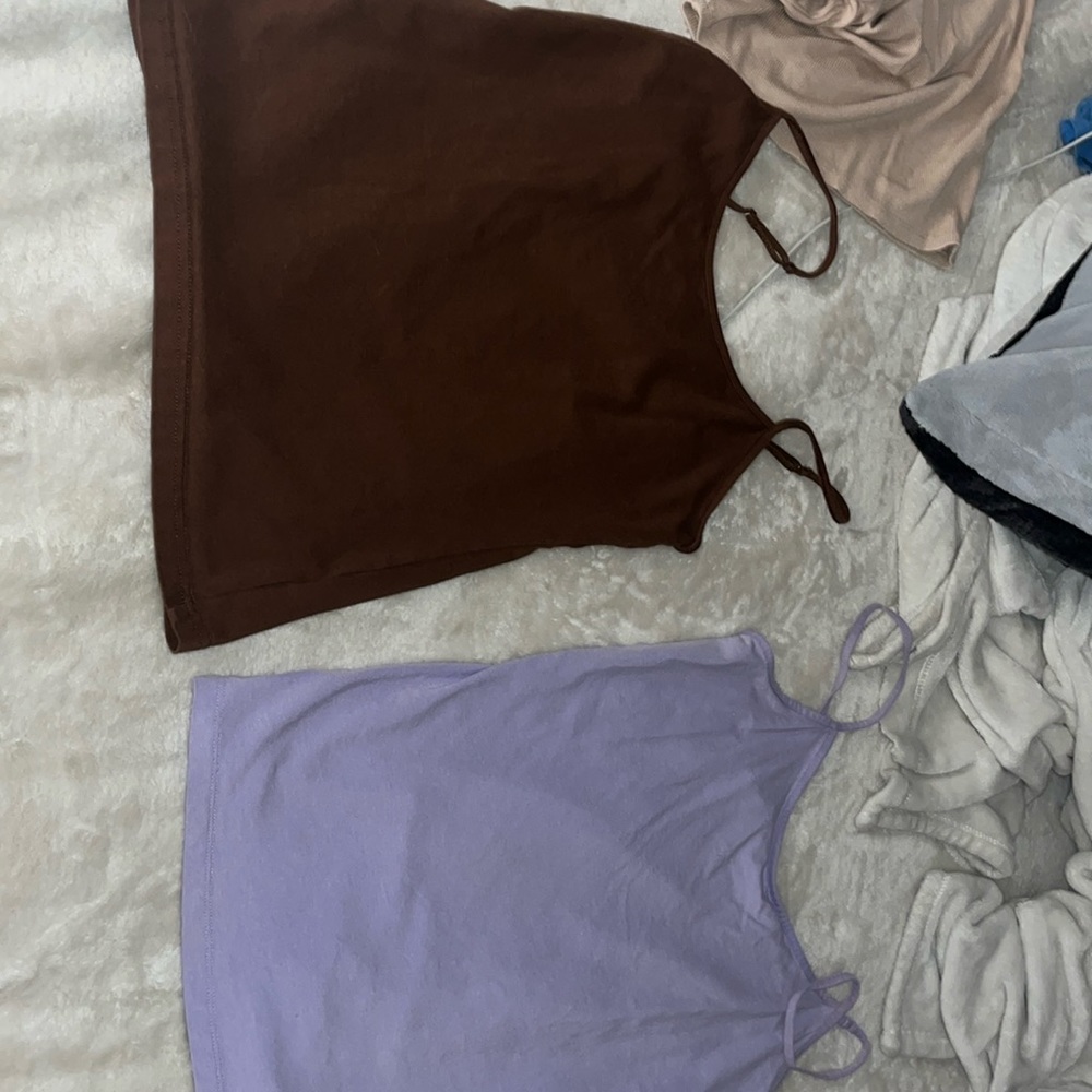 Brown one from gap and a size small. Purple one is time and tru size medium.
